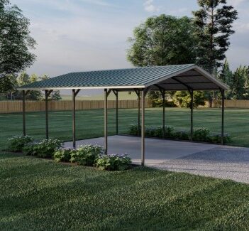 Metal carport at the end of a driveway surrounded by plants.